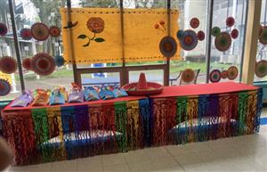  Table with goodie bags and sombrero